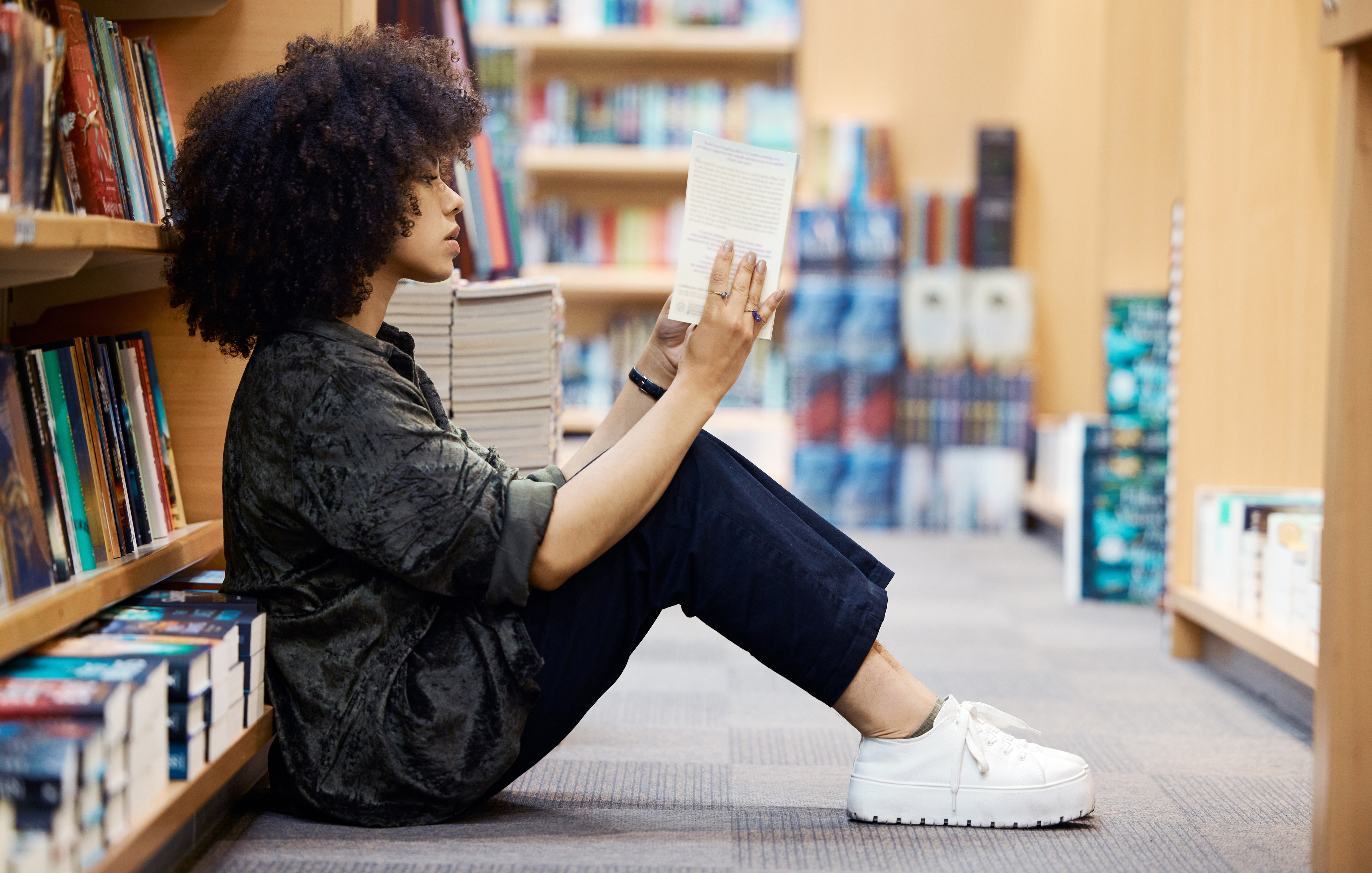 Student sitting in library